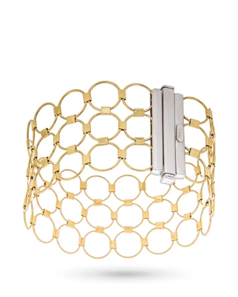 Bracciale in oro giallo e bianco con tre file di cerchi