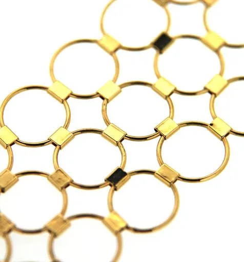 Bracciale in oro giallo e bianco con tre file di cerchi