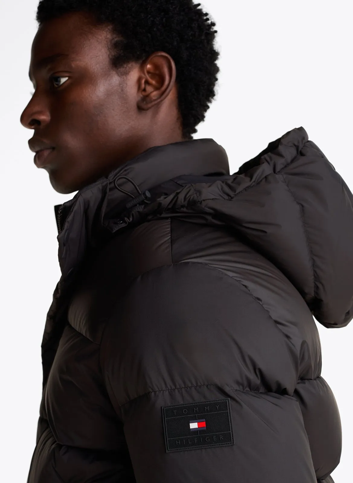  TOMMY HILFIGER   Piumino a collo alto | Nero